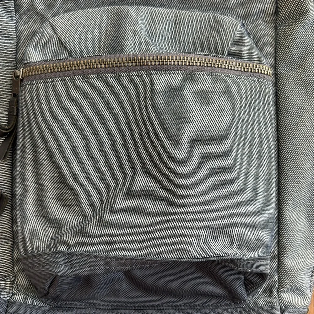Tumi one strap demin backpack